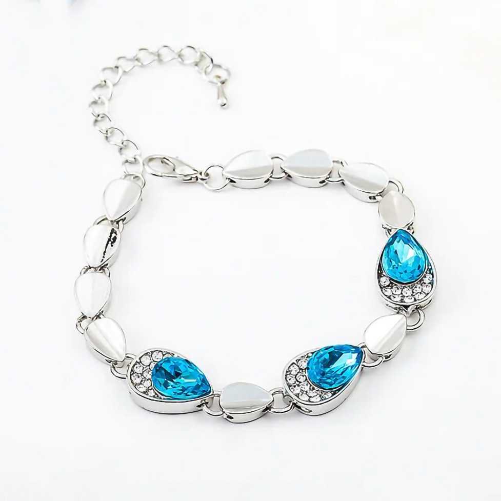 Women's Silver Plated Charm Bracelet With Lobster Claw Closure