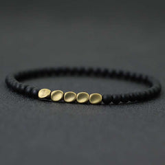 Men's Stylish Stretchable Gold Plated And Black Beaded Bracelet