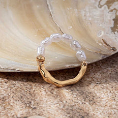 Golden Stretch Ring with Irregular Faux Pearl and Zinc Alloy Design.