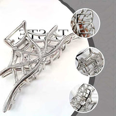 Silvery hollow spiderweb style Halloween hair claw clip with strong grip
