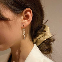 Women's Tassel Leaf Drop Earrings Studded With Zirconia
