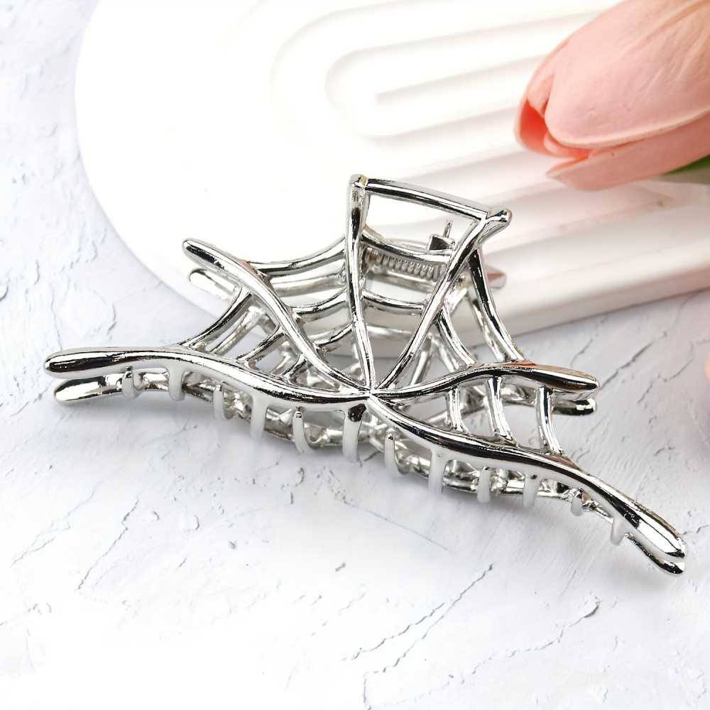 Silvery hollow spiderweb style Halloween hair claw clip with strong grip
